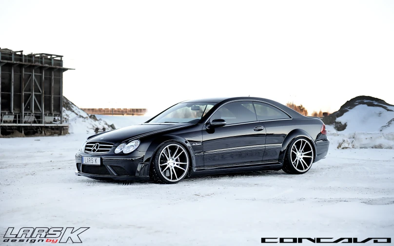 a car in the snow in the middle of nowhere