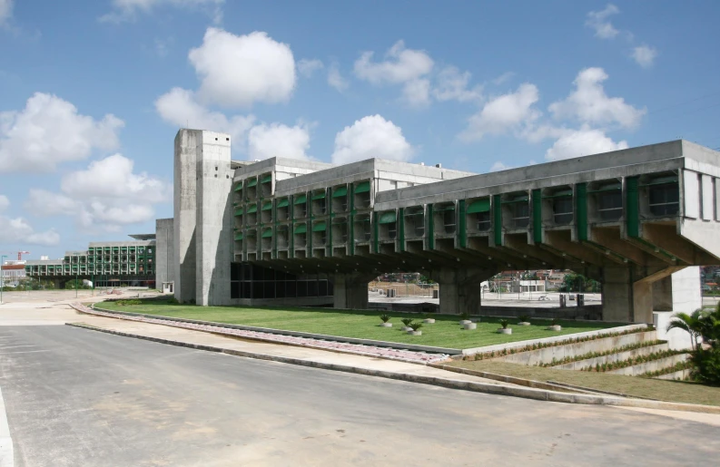 a large building that has been partially built into the sky