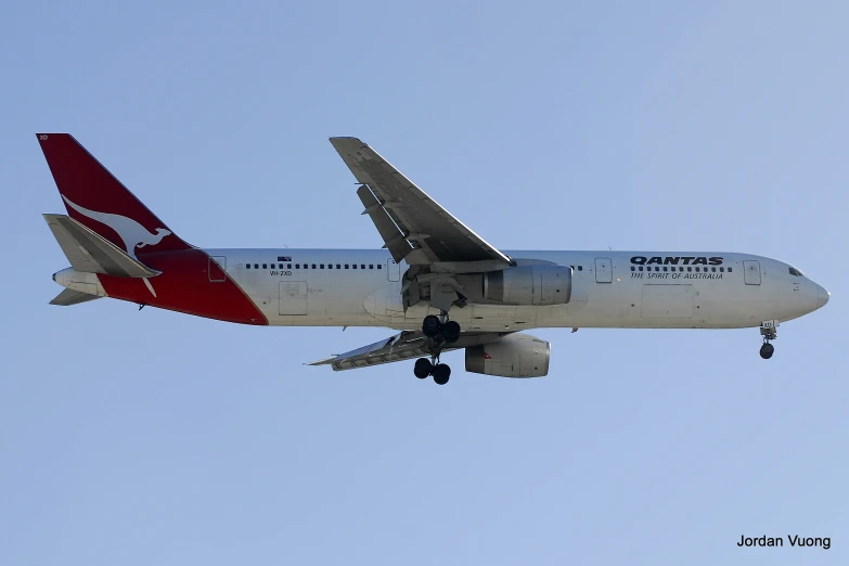 a large commercial plane flying through the sky