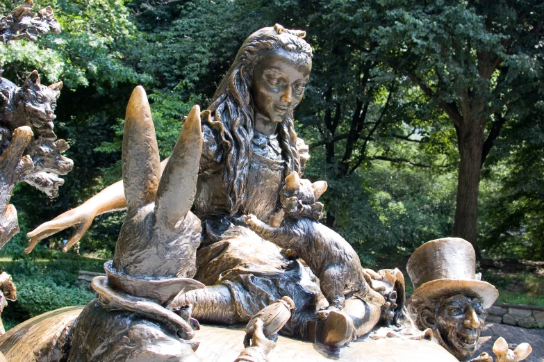 a sculpture of the same woman on her feet