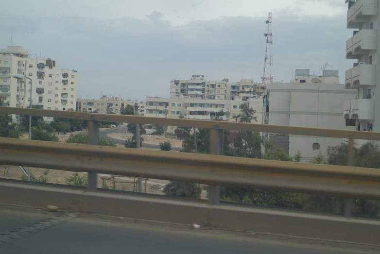 buildings stand in the background on this cloudy day