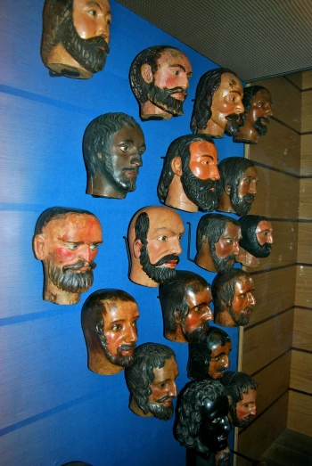 several masks are on display in the shop