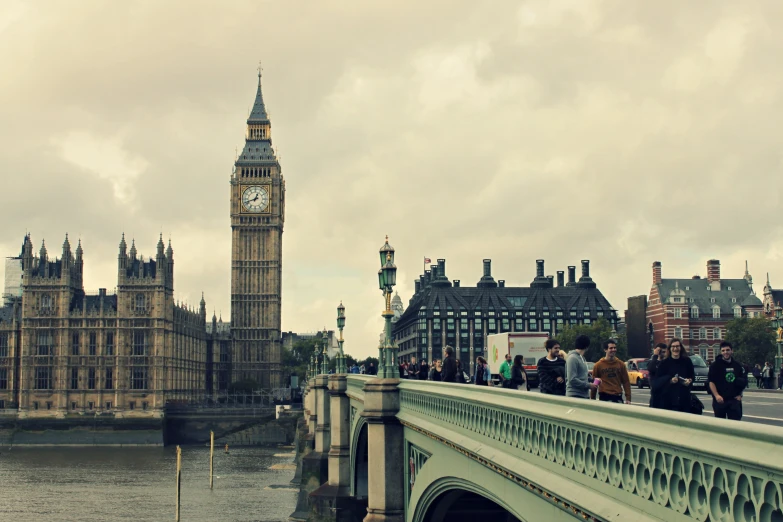 a clock tower in london in the rain