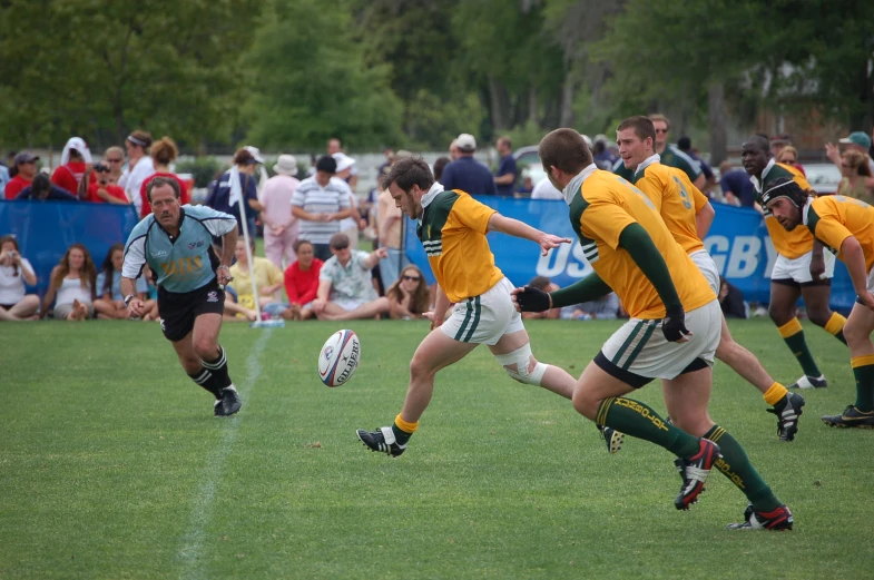 there are players in a game kicking the ball