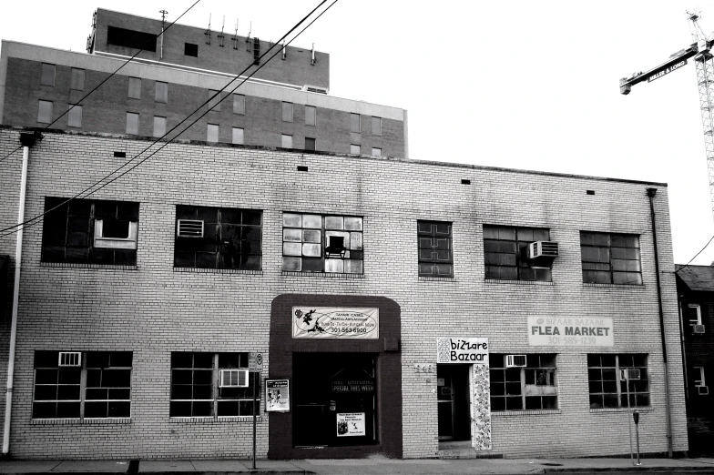 the old fire station has windows all over it