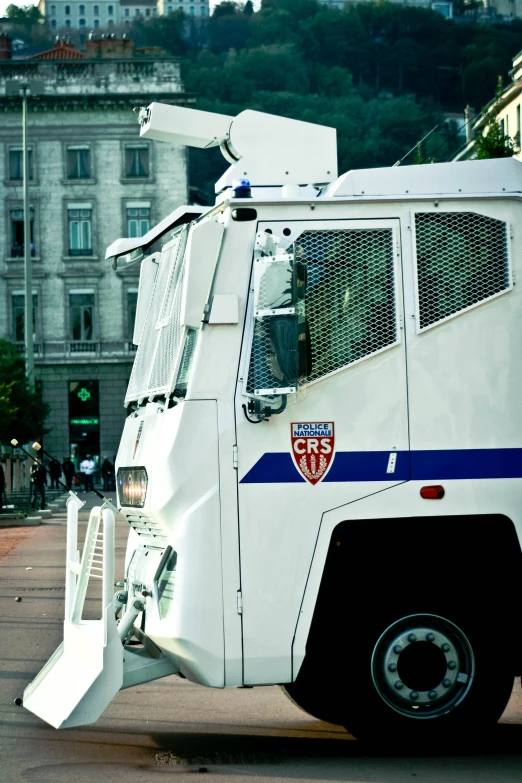 there is a police truck sitting in the street