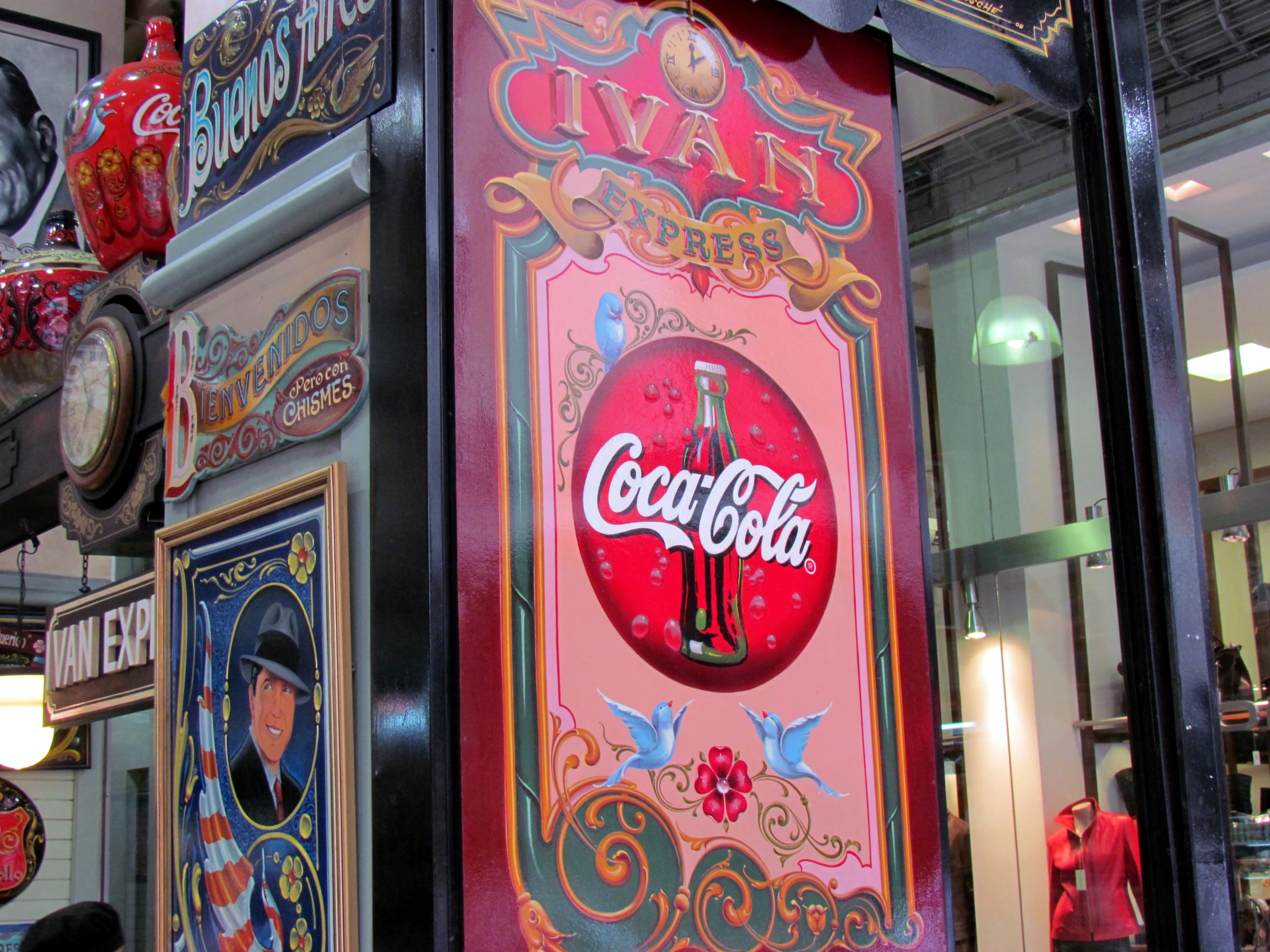 an old fashioned coke machine on display in a shop