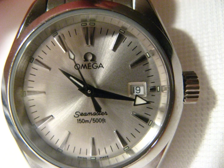 a close up of a watch on a person's wrist