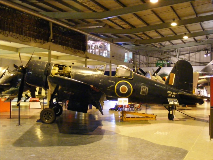 an airplane is sitting on display at a museum