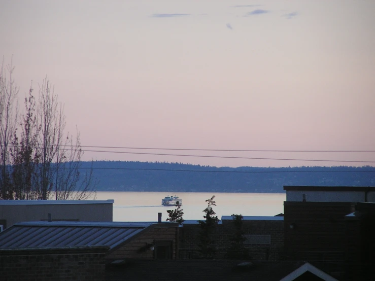 a view of a lake and some building in the background