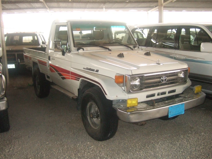 a group of trucks parked in a parking garage