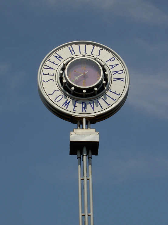 a large clock is on top of the building