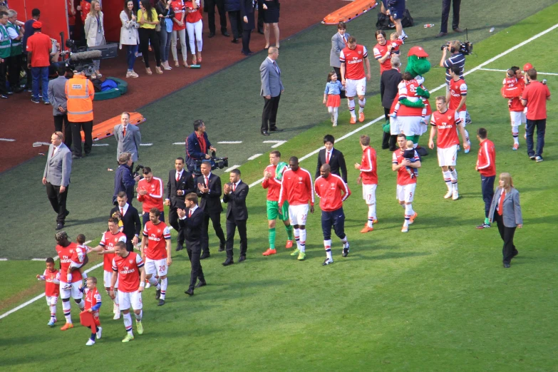 a large group of people on the field