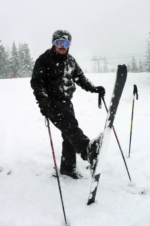 a person holding ski poles in the snow