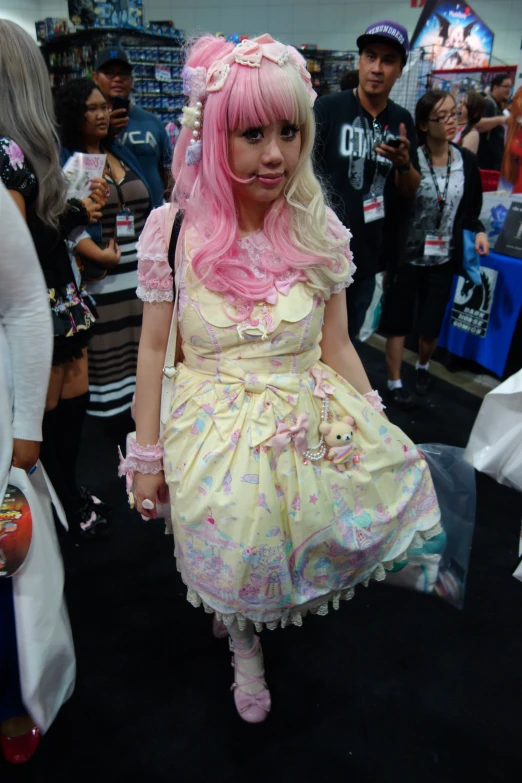 a woman dressed as an anime with pink hair