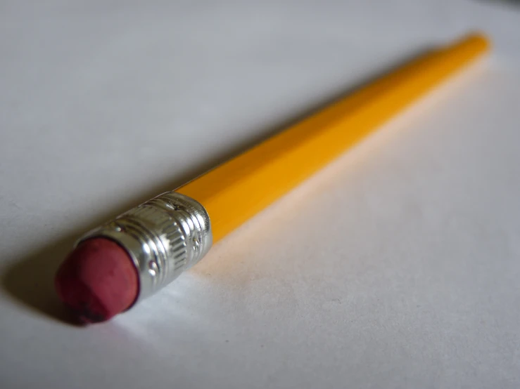 a pencil sitting on top of a table