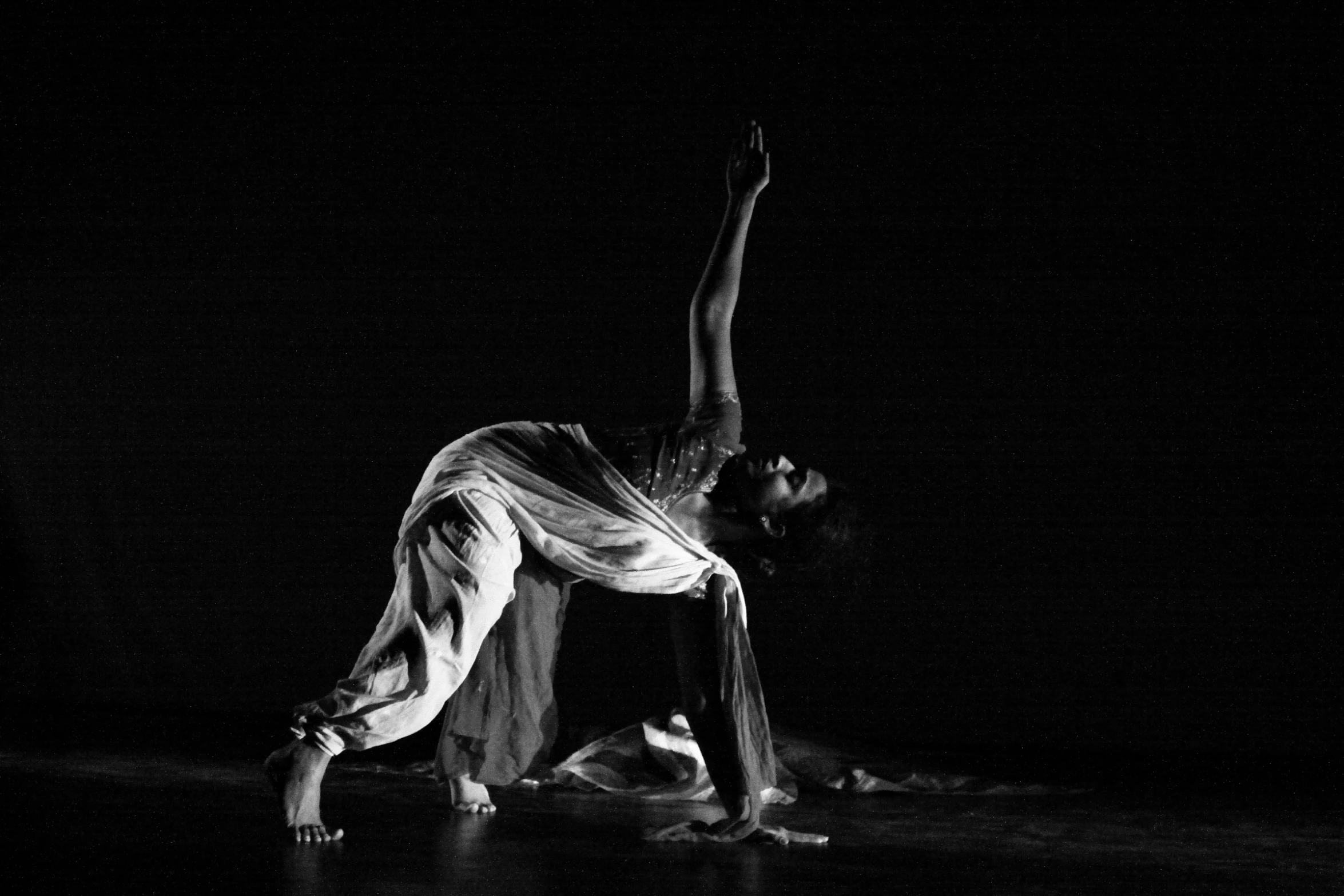 a man doing a split on his legs