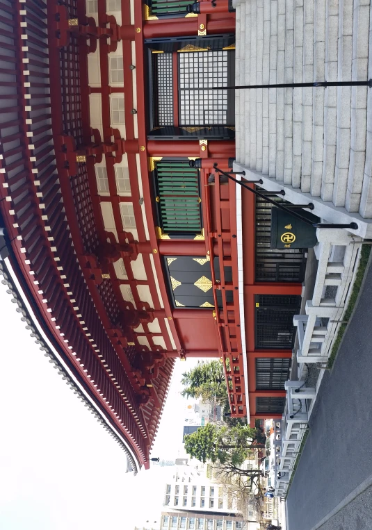 an asian building with stairs and steps in front