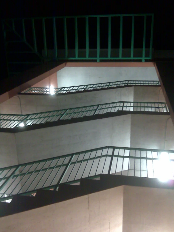 an image of a building at night with light on