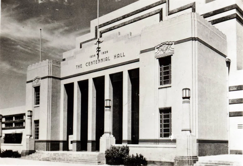 an old black and white po of the front of a building