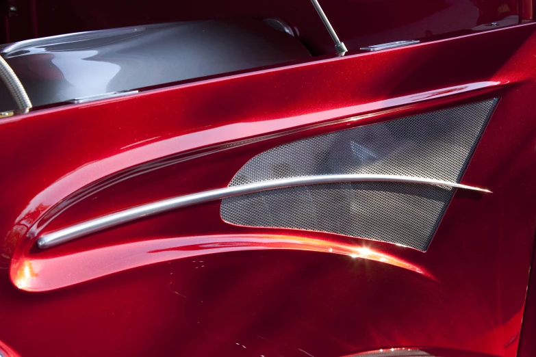 the emblem of a classic american automobile with polished metal