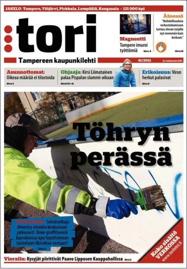 the front page of the magazine tori showing someone on his snowboard