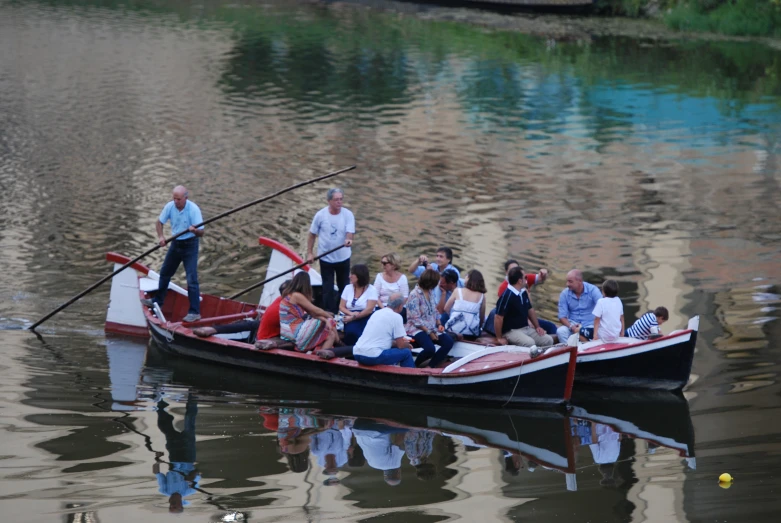 the people in the boat are waiting to go out to sea