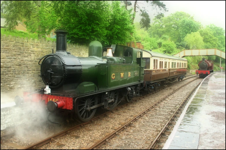 a old steam engine pulling a long train