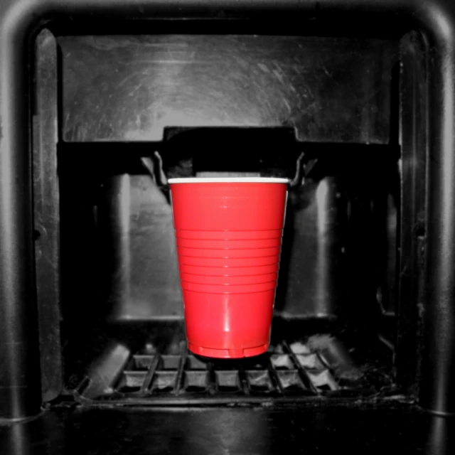 a cup of water is placed inside an oven
