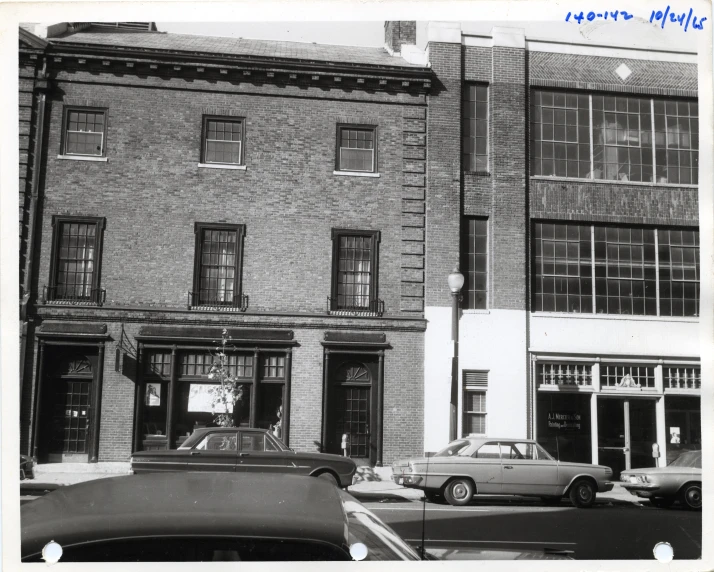 a black and white po of the building that the apartment is in