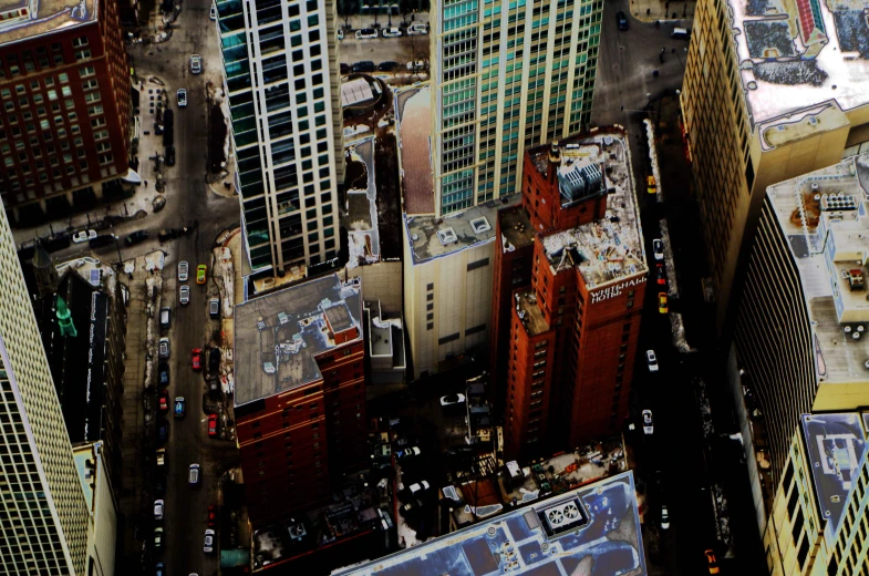 an aerial view of city buildings in a large metropolitan area