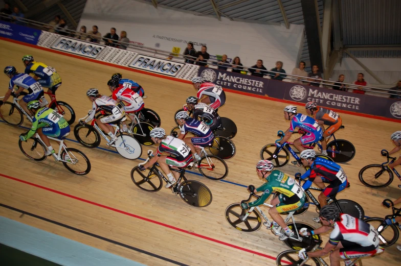 a group of people on bikes racing around