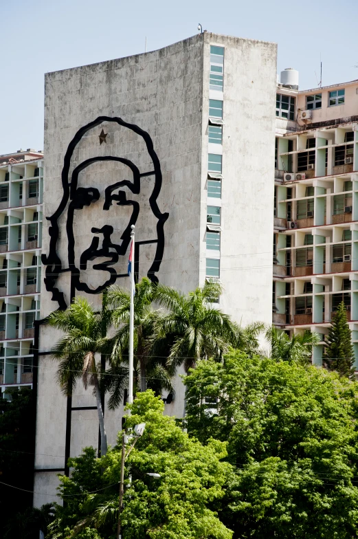 large building with art on the front and back wall