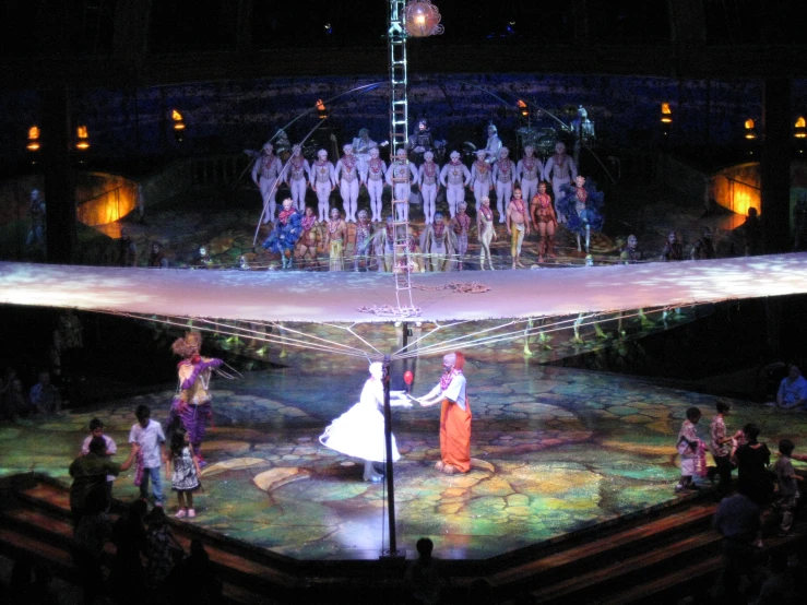 the stage at a musical concert with people dressed in costume