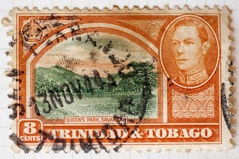 an image of a postage stamp with trees and hills