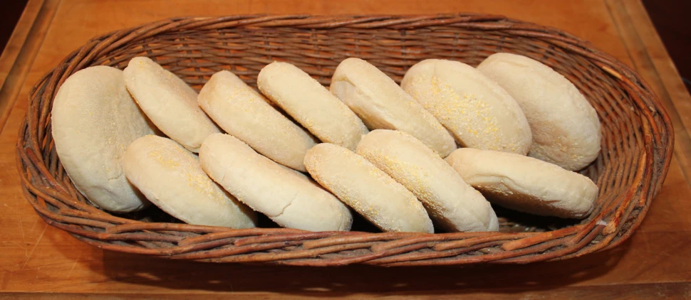 a basket full of pastries on top of a table