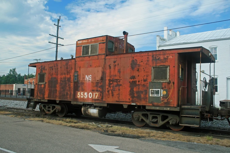 a train car that is parked on the tracks