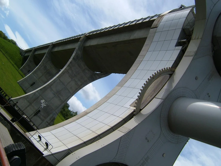 the view up at some big curved bridges