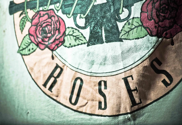 a rose is printed on the side of the shirt