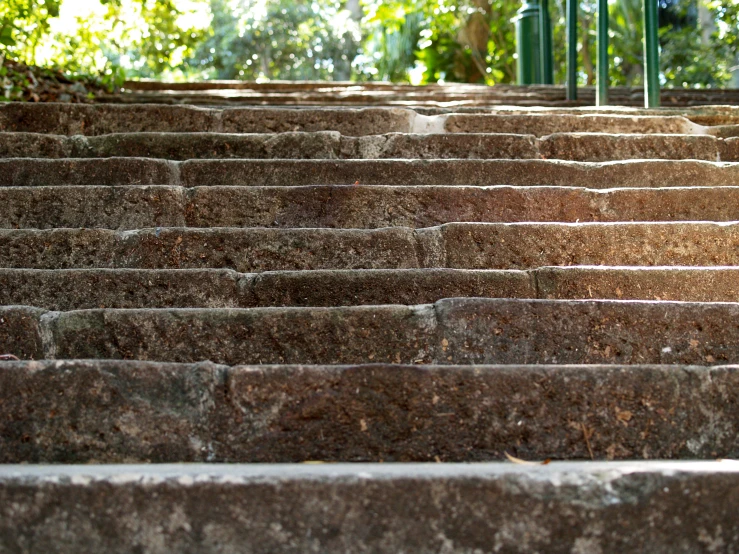 a set of steps that have stone tiles on it