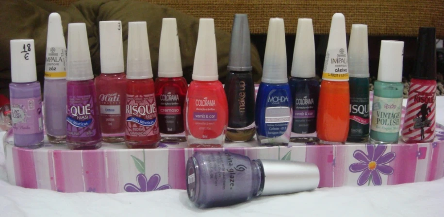 a variety of nail polish and the bottle is displayed