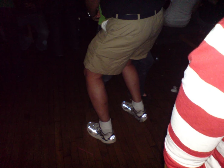 a man is skating around at a party