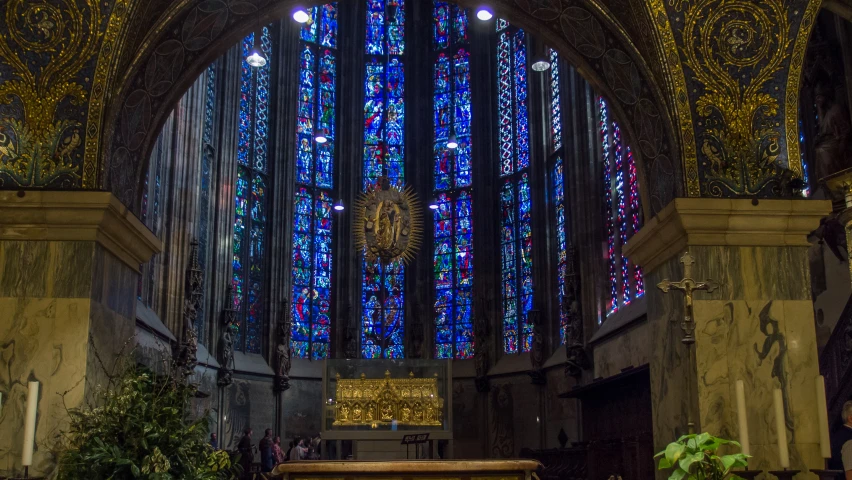 a large cathedral that has an elaborate stained glass window