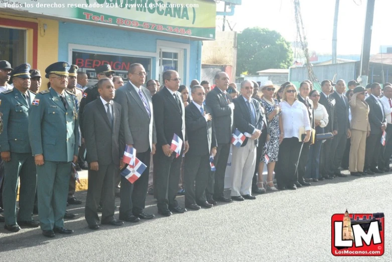 a group of people standing next to each other