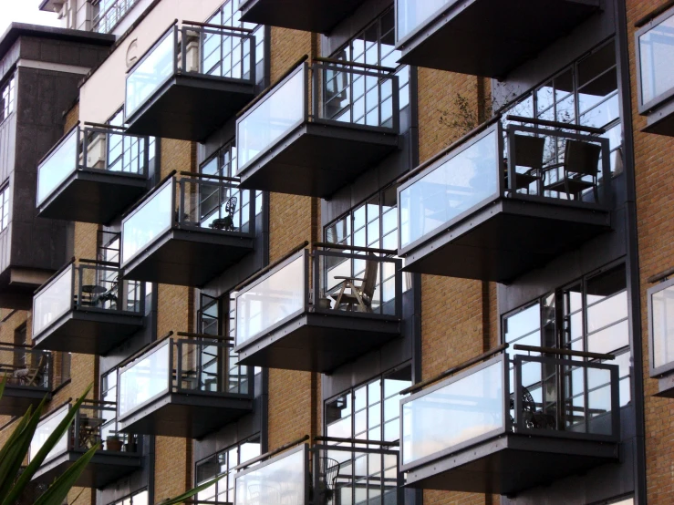 a building has windows and balconies in front of it