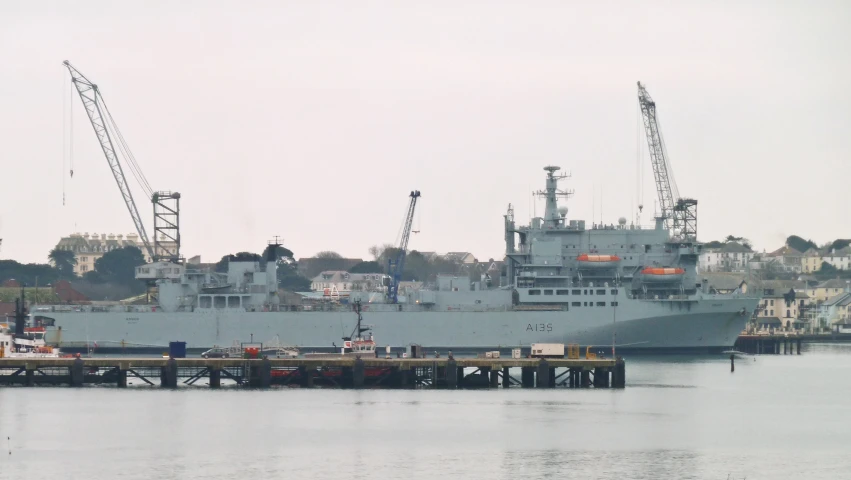 a large ship is sitting on the water