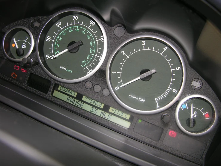 some electronic dashboards with many gauges displayed in them