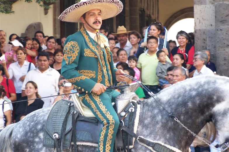 mexican riding horse and crowd at an outdoor event