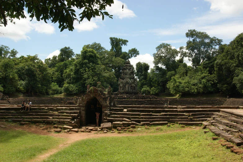 there are stone steps leading up to the cave