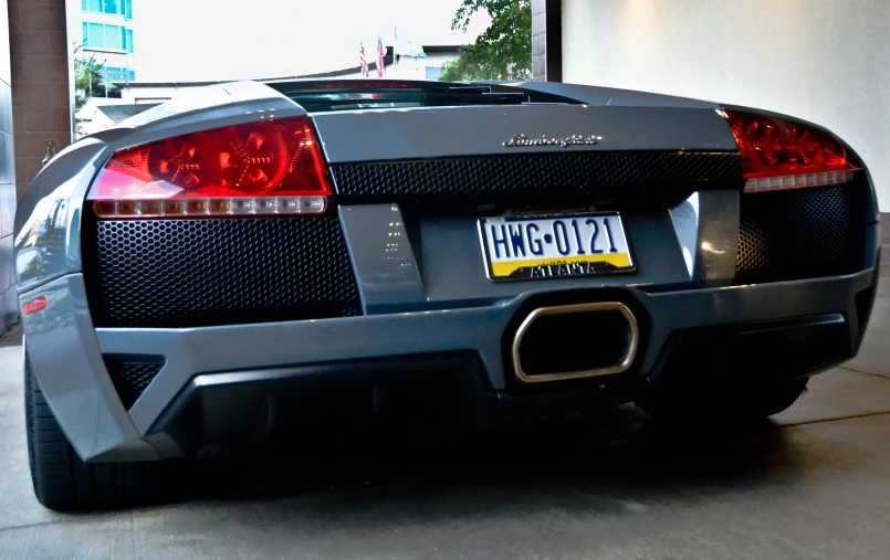 the rear end of a parked gray lamb gt35